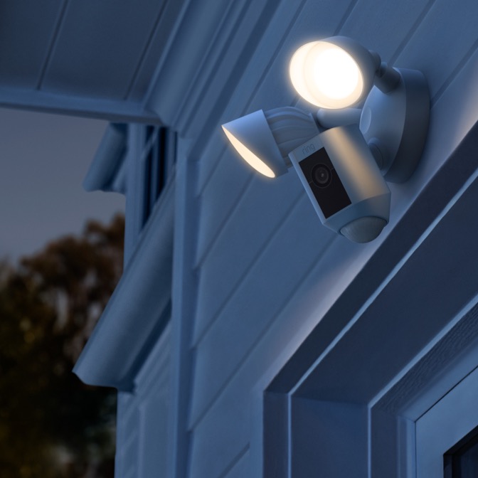 Security light installer in London setting up outdoor lighting safely