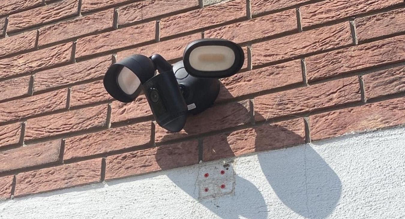 Dusk-to-dawn security light installed on a London property