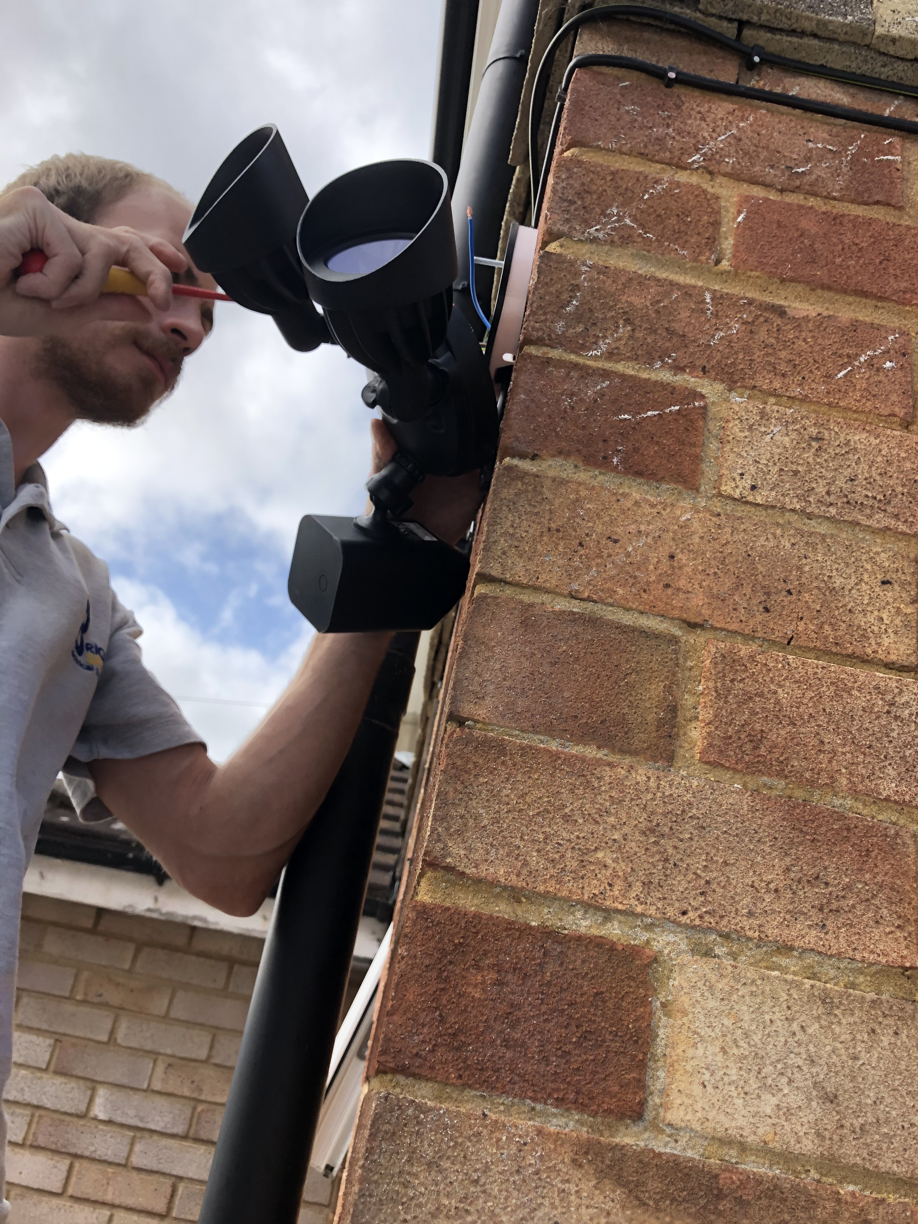 Commercial security lighting for shopfront and rear alley in London